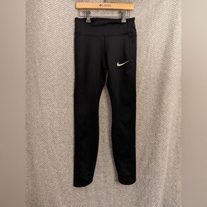 Women's Nike Dri-fit black leggings with cut out detail